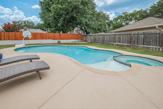 16418 Crawford St, Jersey Village, TX 77040 - view of pool with a fenced backyard, a pool with connected hot tub, and a patio