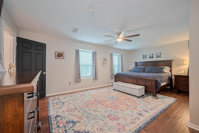 16418 Crawford St, Jersey Village, TX 77040 - bedroom with dark wood-type flooring and ceiling fan