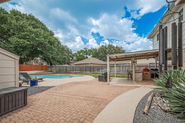 16418 Crawford St, Jersey Village, TX 77040 - view of swimming pool featuring a patio area, area for grilling, and a fenced backyard