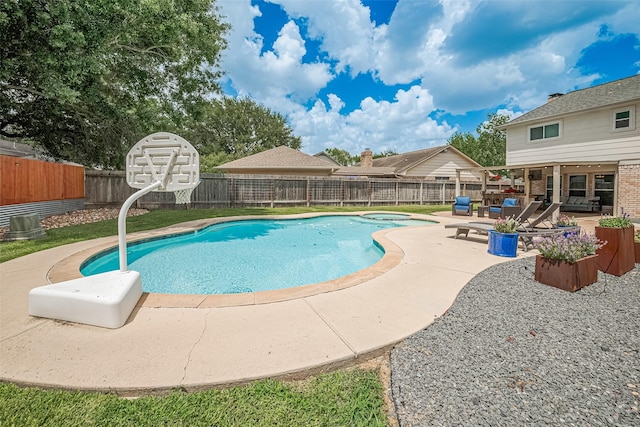 16418 Crawford St, Jersey Village, TX 77040 - view of swimming pool featuring a patio area, a fenced backyard, and a pool with connected hot tub