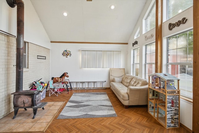 1105 Mesquite St, Baytown, TX 77521 - sunroom / solarium with lofted ceiling and a wood stove