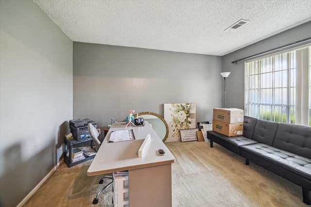 1105 Mesquite St, Baytown, TX 77521 - carpeted office featuring a textured ceiling