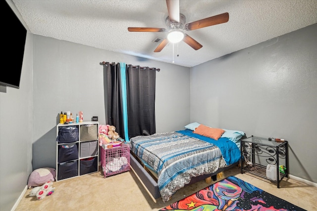 1105 Mesquite St, Baytown, TX 77521 - bedroom featuring a textured ceiling and ceiling fan