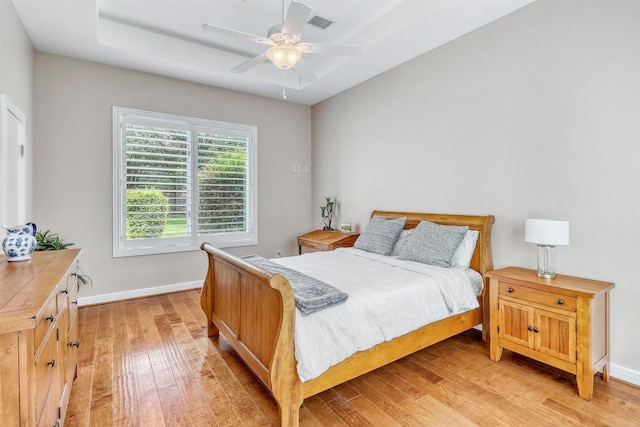 51 Wincrest Falls Dr, Cypress, TX 77429 - bedroom featuring light wood-style flooring and a ceiling fan