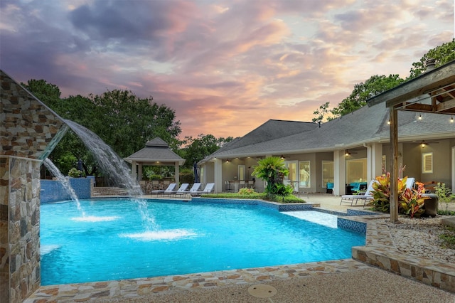 51 Wincrest Falls Dr, Cypress, TX 77429 - swimming pool featuring ceiling fan, a gazebo, and a patio