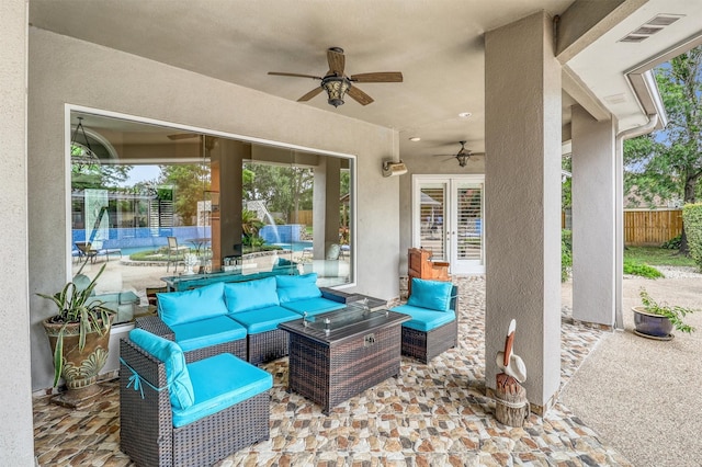 51 Wincrest Falls Dr, Cypress, TX 77429 - view of patio featuring ceiling fan and an outdoor living space