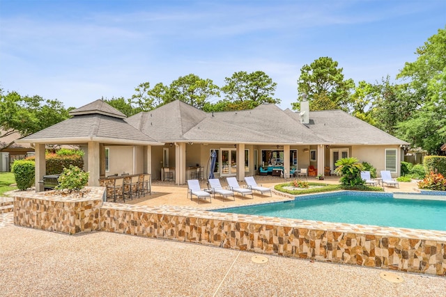 51 Wincrest Falls Dr, Cypress, TX 77429 - outdoor pool with a patio and grilling area