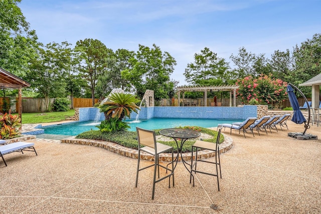 51 Wincrest Falls Dr, Cypress, TX 77429 - view of swimming pool featuring a pergola, a fenced backyard, and a patio area