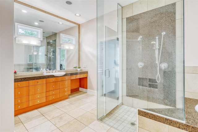 51 Wincrest Falls Dr, Cypress, TX 77429 - full bathroom featuring vanity, a stall shower, tile patterned floors, and recessed lighting
