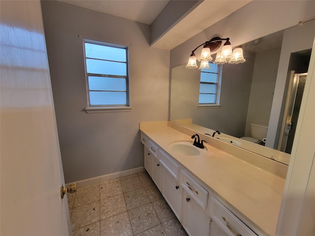5211 Alamosa Ln, Spring, TX 77379 - bathroom with vanity, a chandelier, plenty of natural light, and a shower with shower door