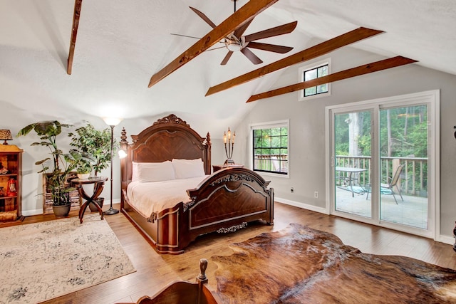 22827 Edward Ln, Tomball, TX 77377 - bedroom featuring access to outside, wood finished floors, and baseboards