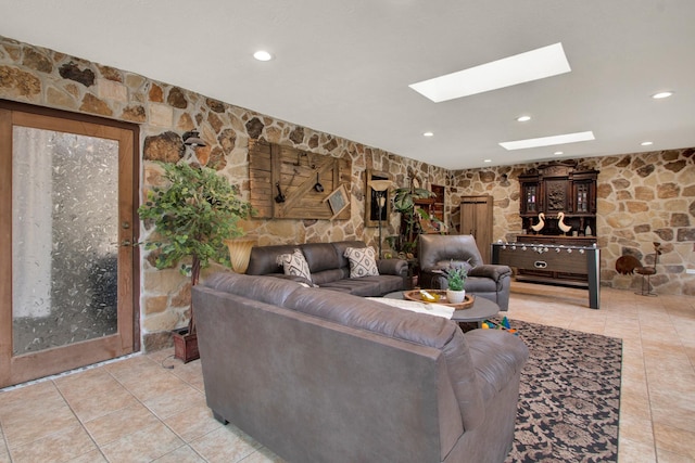 22827 Edward Ln, Tomball, TX 77377 - living area featuring light tile patterned flooring, a skylight, and recessed lighting