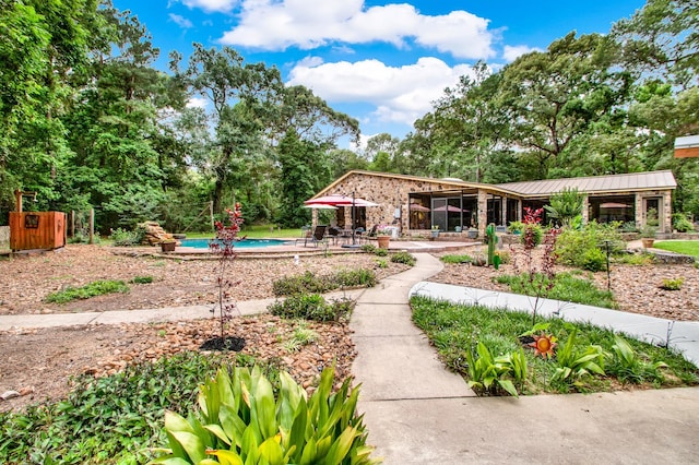 22827 Edward Ln, Tomball, TX 77377 - view of yard featuring a patio area and an outdoor pool