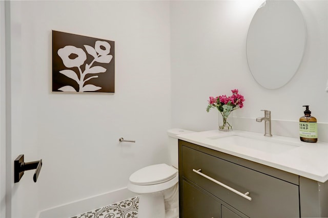311 Marcella St Unit A, Houston, TX 77091 - bathroom featuring vanity, toilet, baseboards, and tile patterned floors