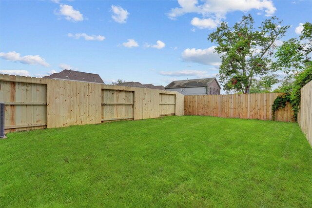 311 Marcella St Unit A, Houston, TX 77091 - view of yard featuring central AC unit