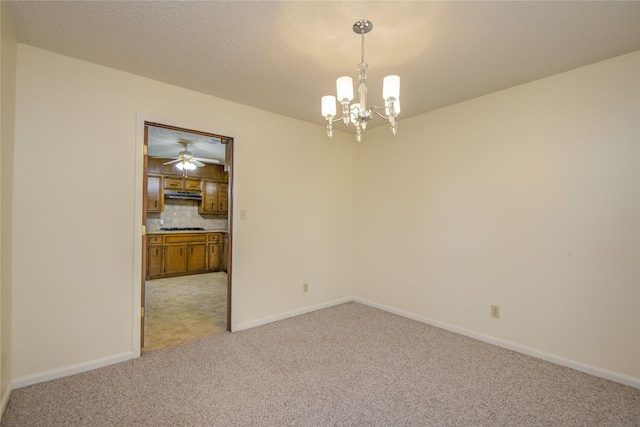 55 Flag Ct, Lake Jackson, TX 77566 - empty room featuring light colored carpet, a chandelier, and baseboards
