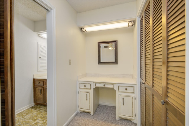 55 Flag Ct, Lake Jackson, TX 77566 - hall featuring a desk and baseboards