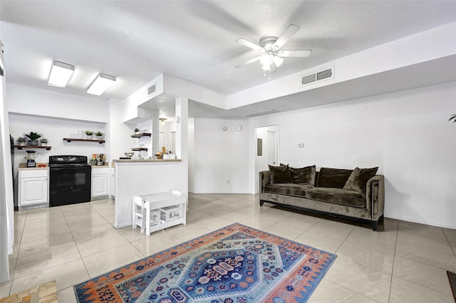2011 Spenwick Dr Unit 415, Houston, TX 77055 - living room featuring a ceiling fan and light tile patterned floors