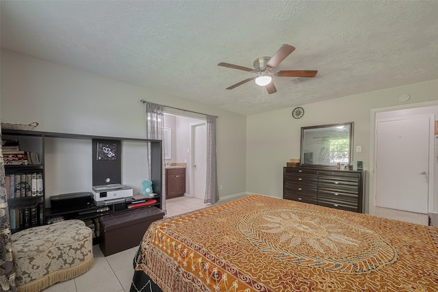 10534 Towne Square Rd, Sugar Land, TX 77498 - bedroom featuring light tile patterned flooring, a textured ceiling, and ceiling fan