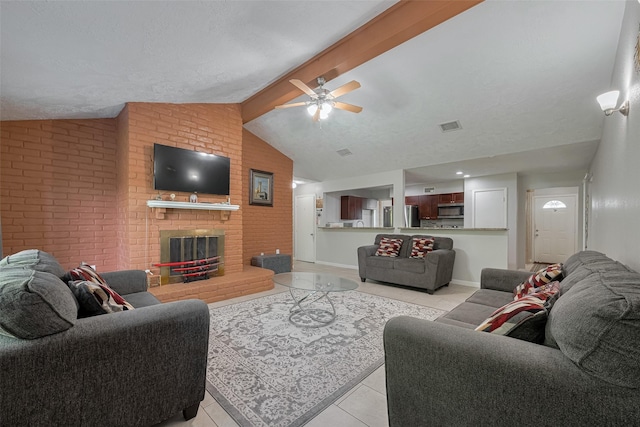 10534 Towne Square Rd, Sugar Land, TX 77498 - living room featuring light tile patterned flooring, a ceiling fan, and a fireplace