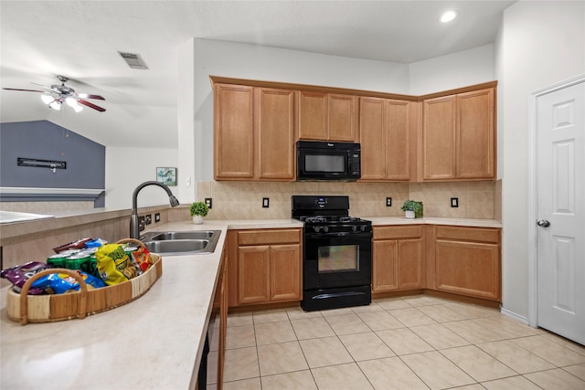 18206 Eton Ridge Ct, Richmond, TX 77407 - kitchen featuring black appliances, a sink, light countertops, tasteful backsplash, and lofted ceiling