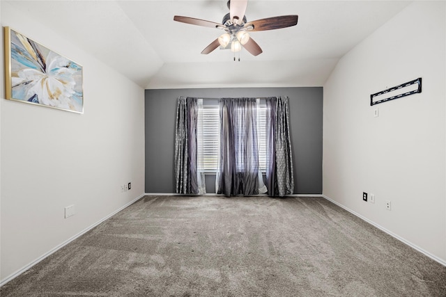 18206 Eton Ridge Ct, Richmond, TX 77407 - empty room featuring carpet floors, lofted ceiling, a ceiling fan, and baseboards