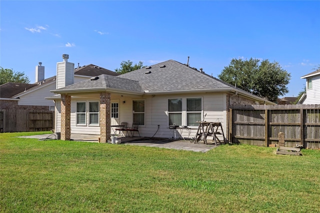 18206 Eton Ridge Ct, Richmond, TX 77407 - rear view of property featuring a patio area and roof with shingles