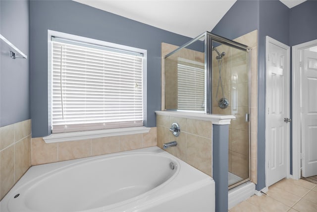 18206 Eton Ridge Ct, Richmond, TX 77407 - bathroom featuring a garden tub, a stall shower, and tile patterned floors