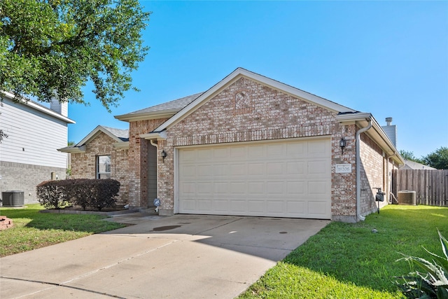 18206 Eton Ridge Ct, Richmond, TX 77407 - ranch-style house with an attached garage, brick siding, concrete driveway, a chimney, and central air condition unit