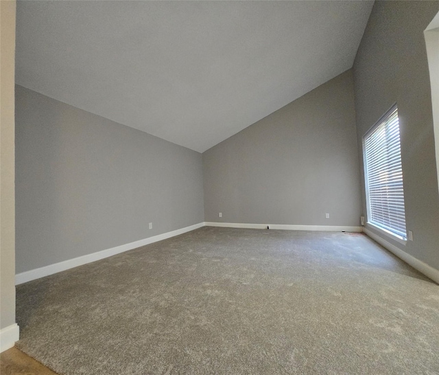 6502 Trail Valley Way, Houston, TX 77086 - empty room with lofted ceiling, carpet, and baseboards
