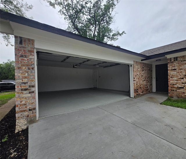 6502 Trail Valley Way, Houston, TX 77086 - garage featuring driveway