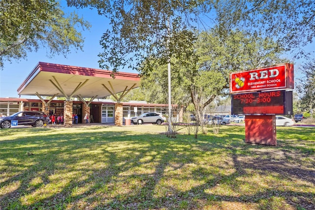 4813 Hummingbird St, Houston, TX 77035 - view of home's community with a lawn