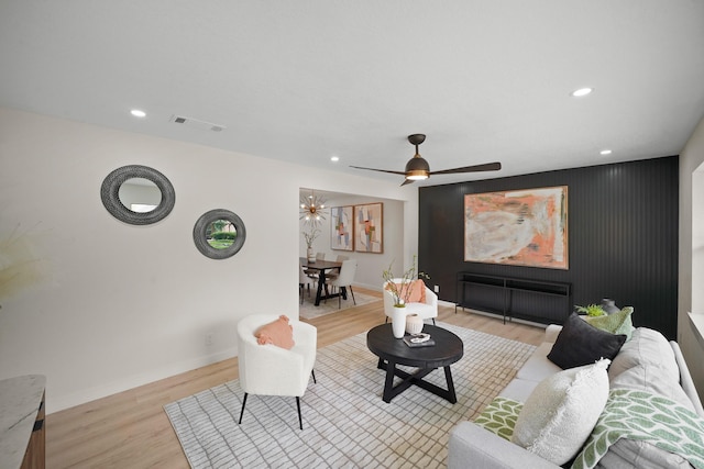 4813 Hummingbird St, Houston, TX 77035 - living area with light wood-style flooring, recessed lighting, and ceiling fan