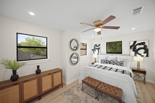 4813 Hummingbird St, Houston, TX 77035 - bedroom with light wood-style flooring, recessed lighting, and a ceiling fan