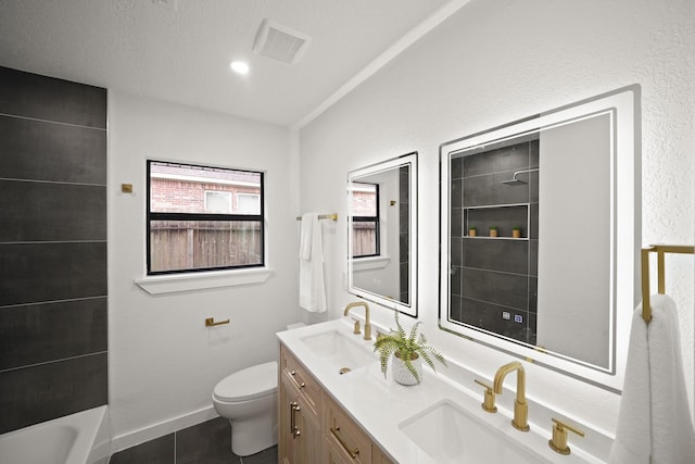 4813 Hummingbird St, Houston, TX 77035 - bathroom with double vanity and tile patterned floors