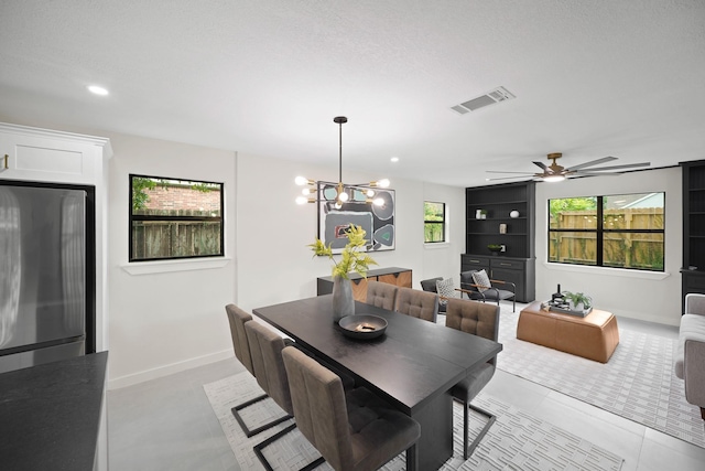 4813 Hummingbird St, Houston, TX 77035 - dining room featuring a ceiling fan, recessed lighting, and a chandelier