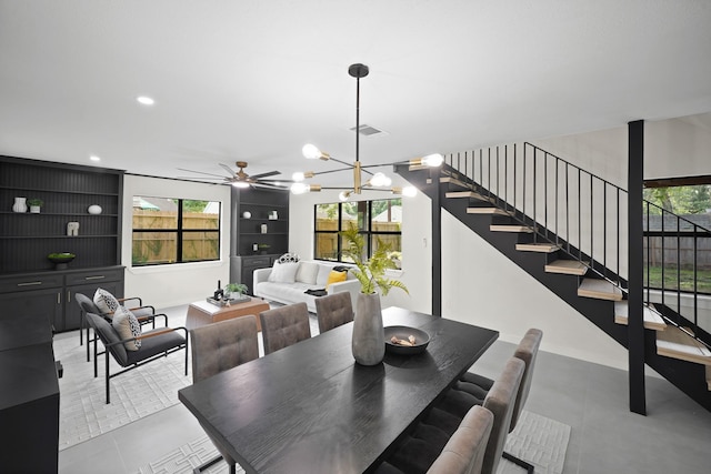 4813 Hummingbird St, Houston, TX 77035 - dining area with stairway, recessed lighting, a chandelier, and ceiling fan