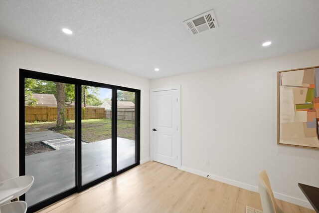 4813 Hummingbird St, Houston, TX 77035 - spare room with wood finished floors and recessed lighting