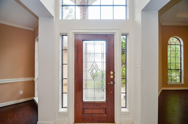 14403 Reissen Ln, Houston, TX 77069 - entryway featuring wood finished floors, ornamental molding, and baseboards
