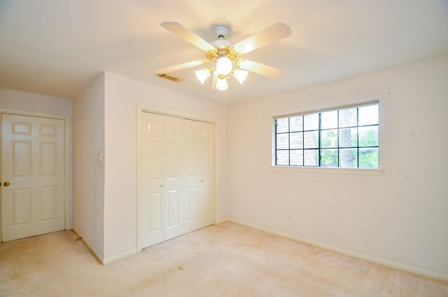 14403 Reissen Ln, Houston, TX 77069 - unfurnished bedroom featuring a closet, light carpet, and baseboards