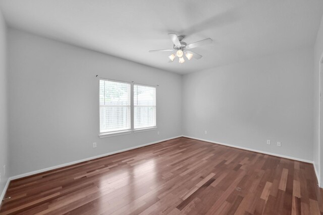25819 Oakridge Forest Ln, Spring, TX 77386 - unfurnished room with ceiling fan, wood finished floors, and baseboards