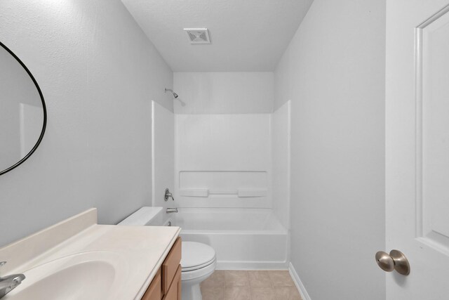 25819 Oakridge Forest Ln, Spring, TX 77386 - bathroom featuring vanity, toilet, tile patterned floors,  shower combination, and baseboards