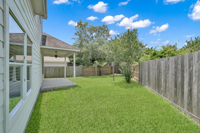 25819 Oakridge Forest Ln, Spring, TX 77386 - view of yard featuring a ceiling fan and a patio