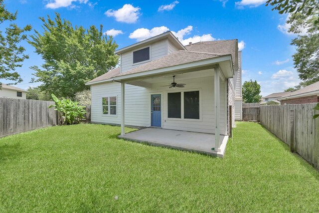 25819 Oakridge Forest Ln, Spring, TX 77386 - rear view of house with ceiling fan, roof with shingles, and a patio