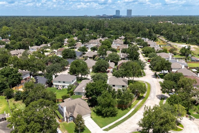 25819 Oakridge Forest Ln, Spring, TX 77386 - aerial view of residential area featuring a heavily wooded area