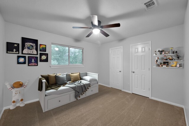 25819 Oakridge Forest Ln, Spring, TX 77386 - bedroom with carpet flooring, baseboards, and a ceiling fan