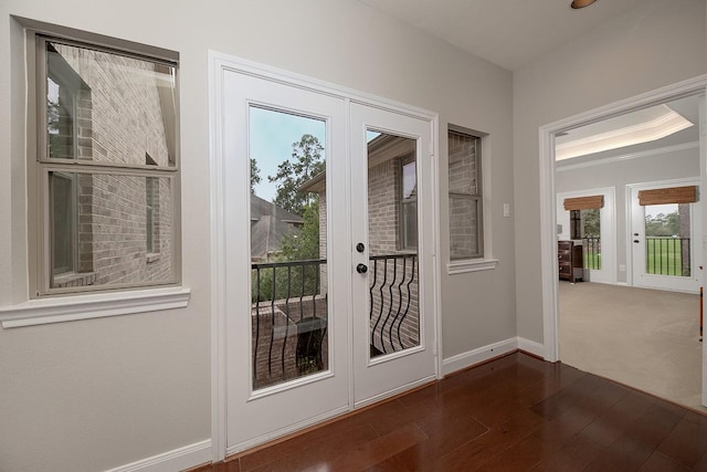 70 N Knights Crossing Dr, The Woodlands, TX 77382 - entryway with baseboards, dark wood-type flooring, and french doors