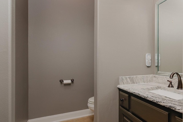 70 N Knights Crossing Dr, The Woodlands, TX 77382 - half bathroom with toilet, vanity, and tile patterned floors