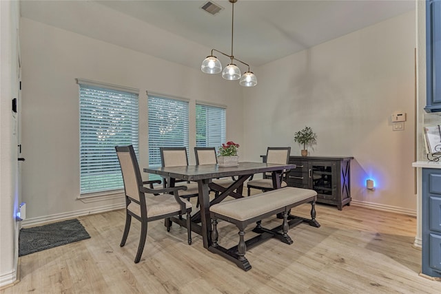 11 Hillsborough Dr E, Montgomery, TX 77356 - dining area featuring light wood-type flooring and baseboards