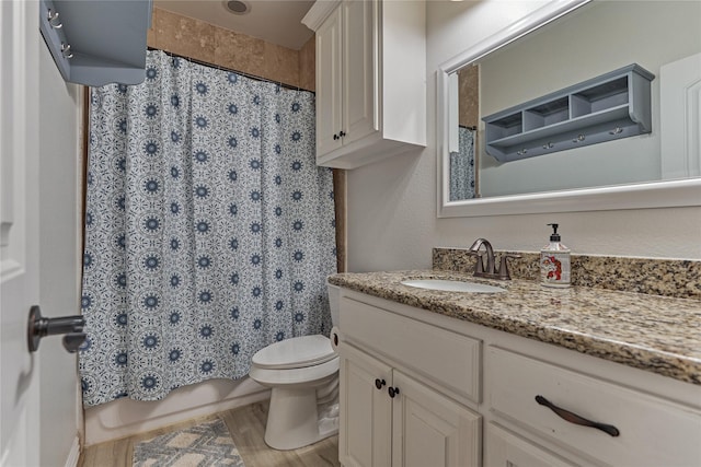 11 Hillsborough Dr E, Montgomery, TX 77356 - bathroom with vanity, toilet, and wood finished floors